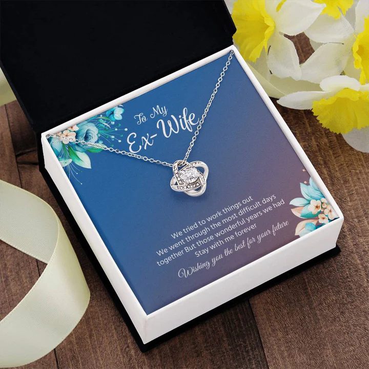 Finished necklace photographed in its gift box with a printed card